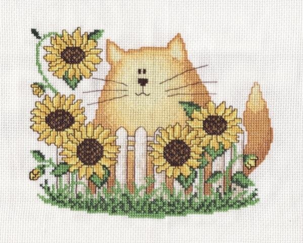 "Подсолнечный кот"
А мой - улыбается!