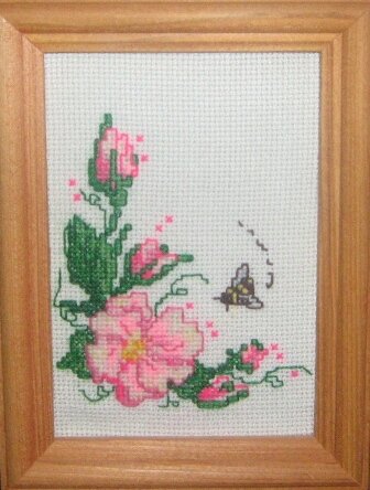 Учила младшего сына вышивать. Почти всю работу сделал он сам. Ему тоды было 9 лет.