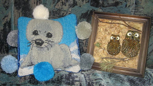 Слева - вышитая маленькая подушечка сделанная мною специально для 15-летней очень больной девушки, чтобы как-то приободрить её, за не имением возможности помочь ей материально. Я её знать не знала, по