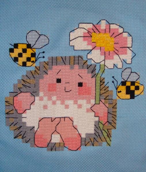 ежик с цветком