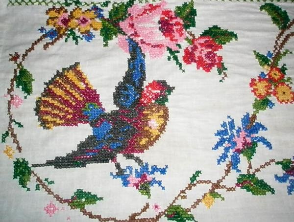 это видимо бабушка вышивала (крест на ткани)