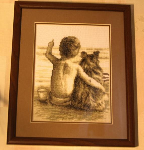 картина вышивалась по схемке с этого сайта,мальчик-точная копия моего сынишки