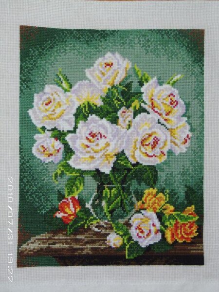 Розы в вазе