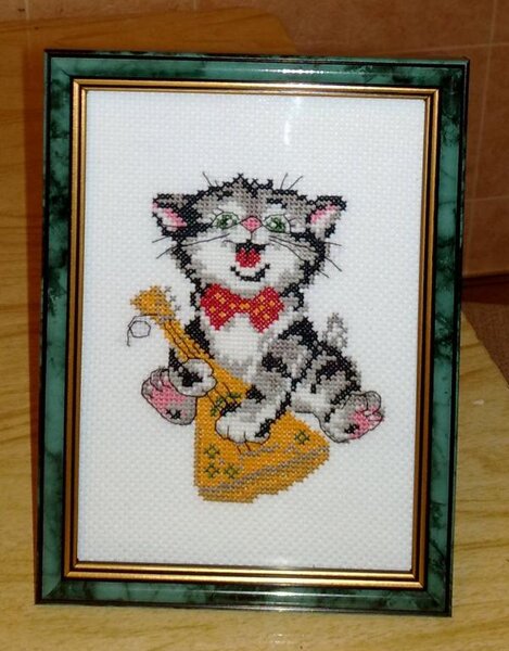 Подарок учительнице по фортепьяно к Новому году Кота.