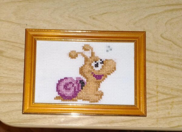 Первая работа дочери. Сшита за зимние каникулы 2011 года. Звёздочки придуманы ею по ходу, для придания улитке мечтательности.