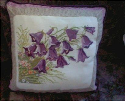 02.Подушка «Ностальгия».
Набор «Золотое руно».
Вышивка нашита на подушку, связанную крючком.