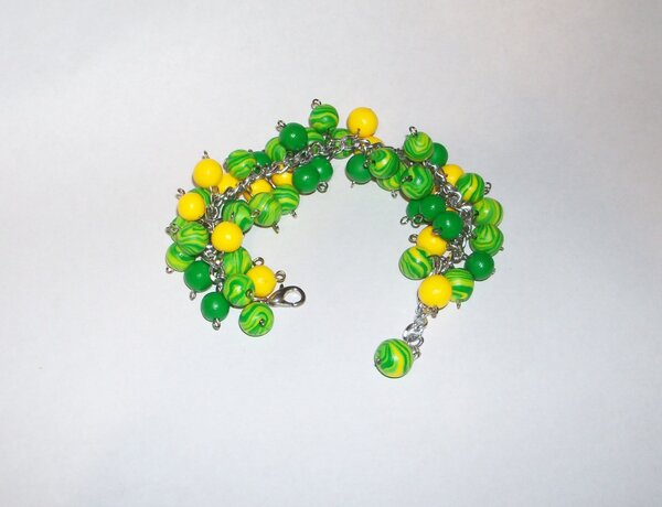 Моя первая работа из пластики. Браслет из бусин. Очень его люблю.